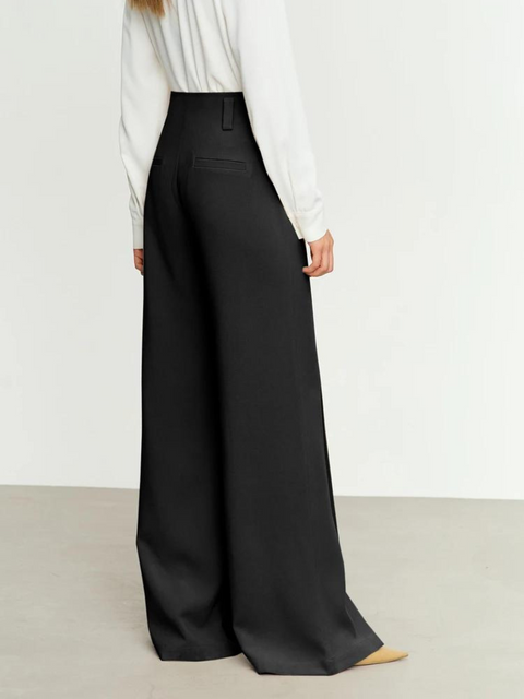 a pair of wide leg, ankle length trousers with a slit design at the hem. 