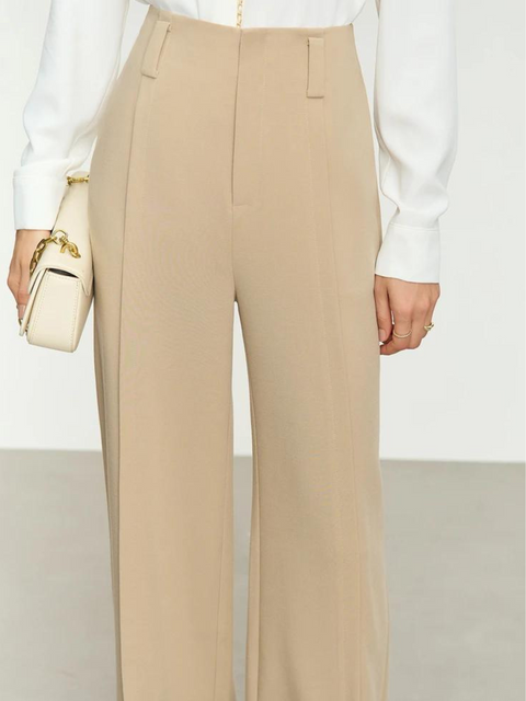 a pair of wide leg, ankle length trousers in a khaki color with a slit design at the hem. 