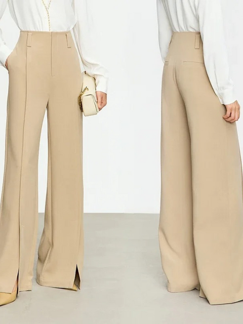 a pair of wide leg, ankle length trousers in a khaki color with a slit design at the hem. 