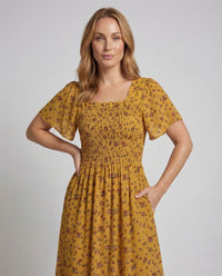 Damen Sommerkleid mit Smokoberteil Puffärmel Volantrock